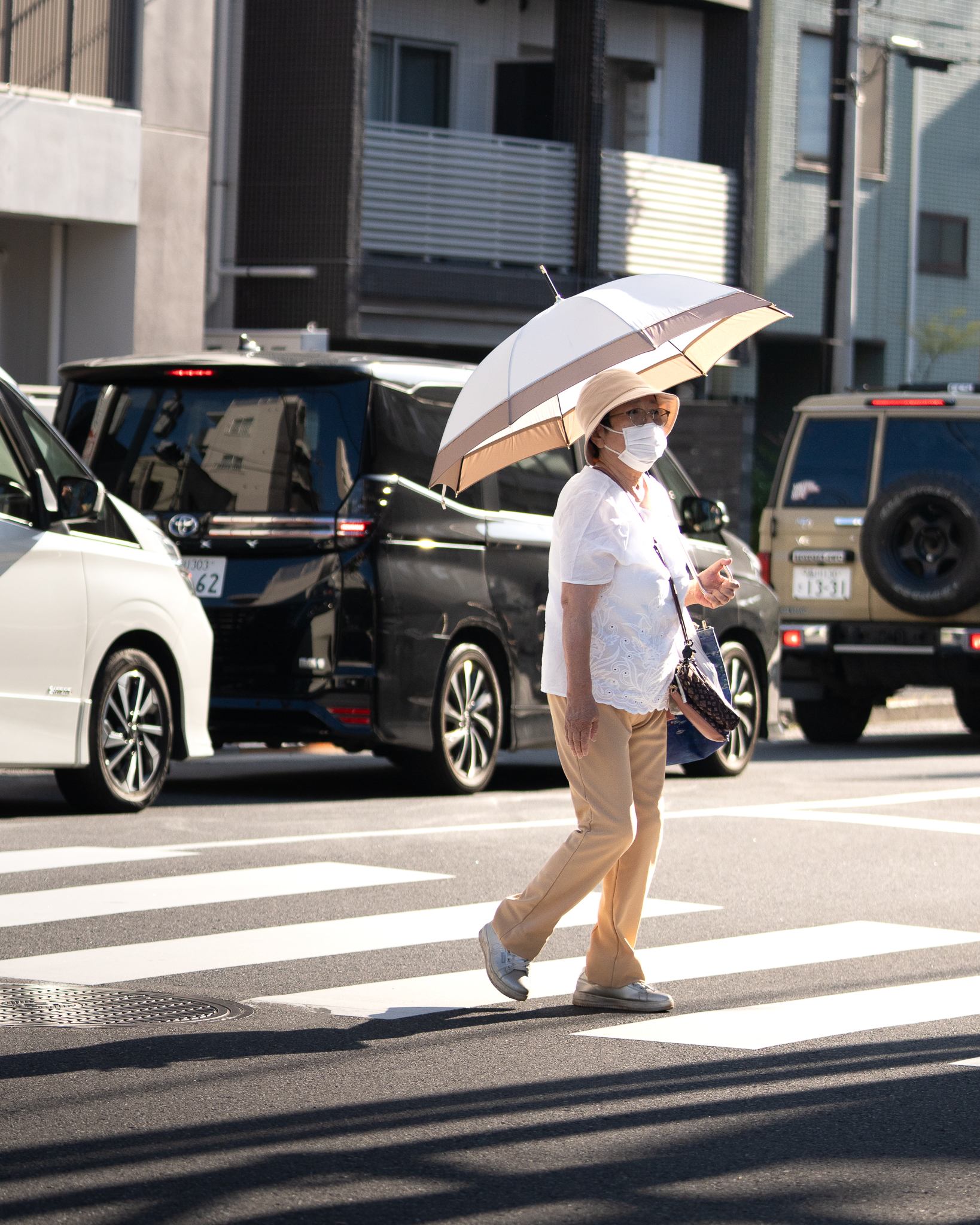 Candid street photograph, frame 11 of 14